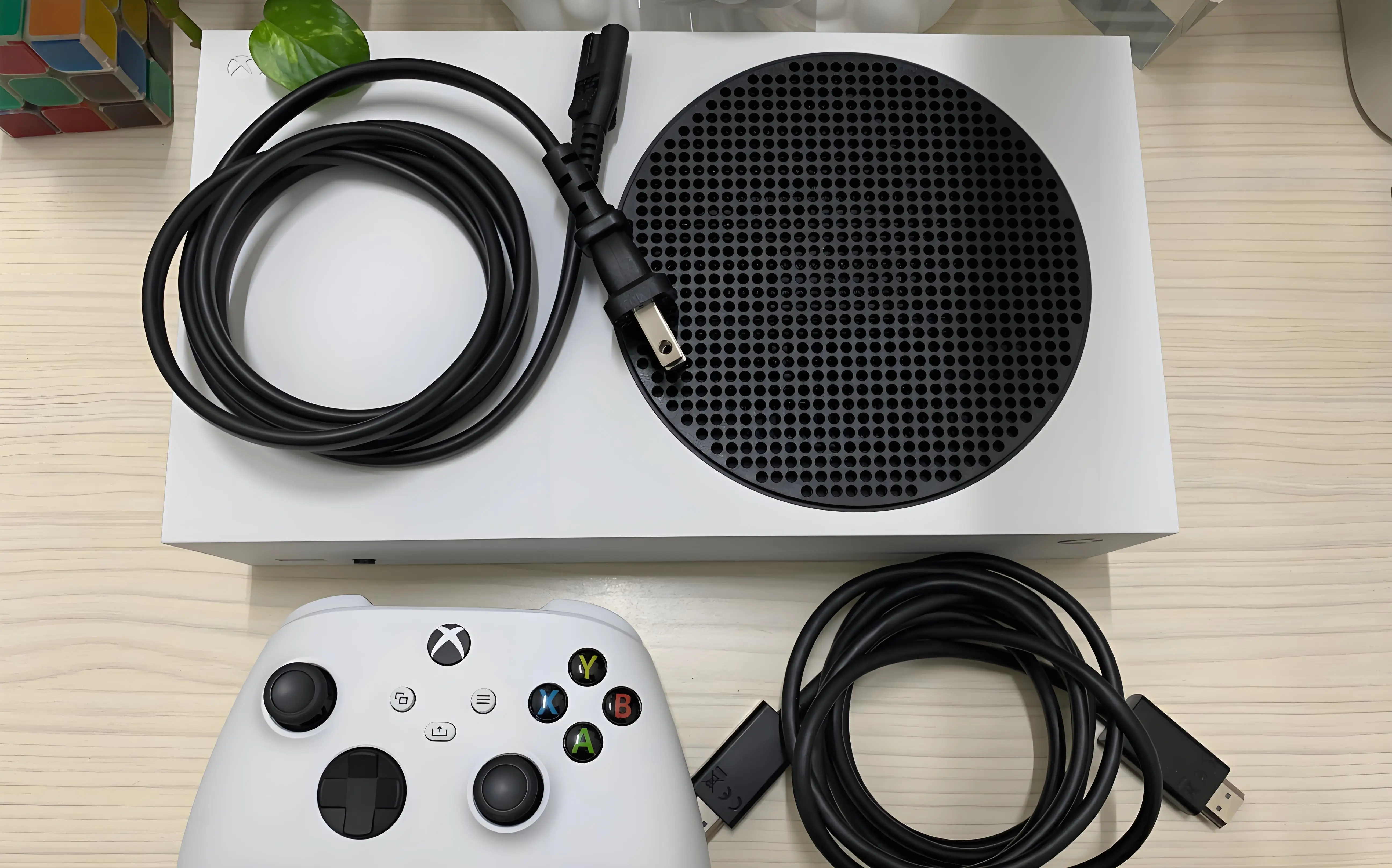 Xbox Series X console with controller and accessories laid out professionally for pawn shop evaluation